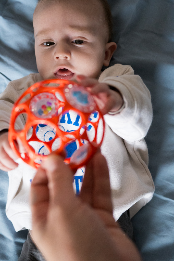 OBALL Hračka Oball RATTLE 10 cm orange 0m+